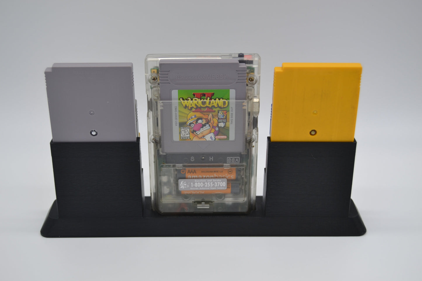 Nintendo Game Boy Pocket & 6 Game Display Stand